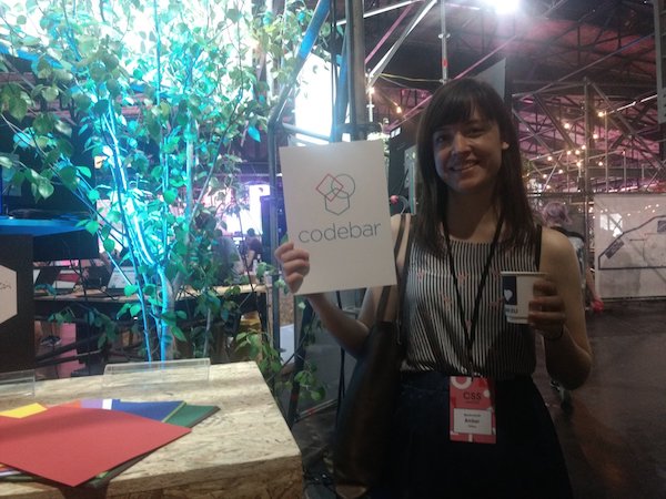 Amber holding the codebar poster