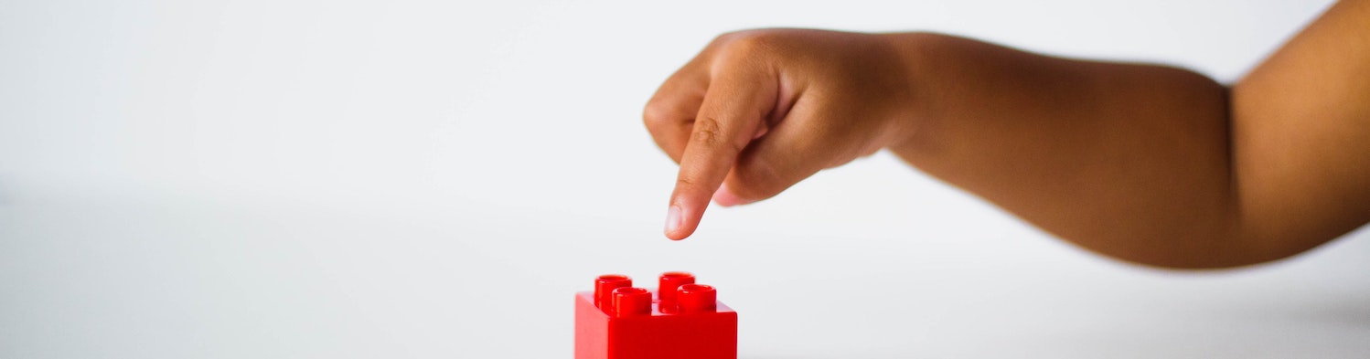 a child playing with lego